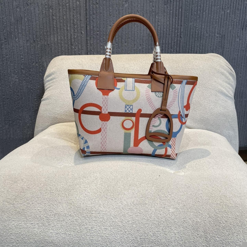 H**mes shopping bags
